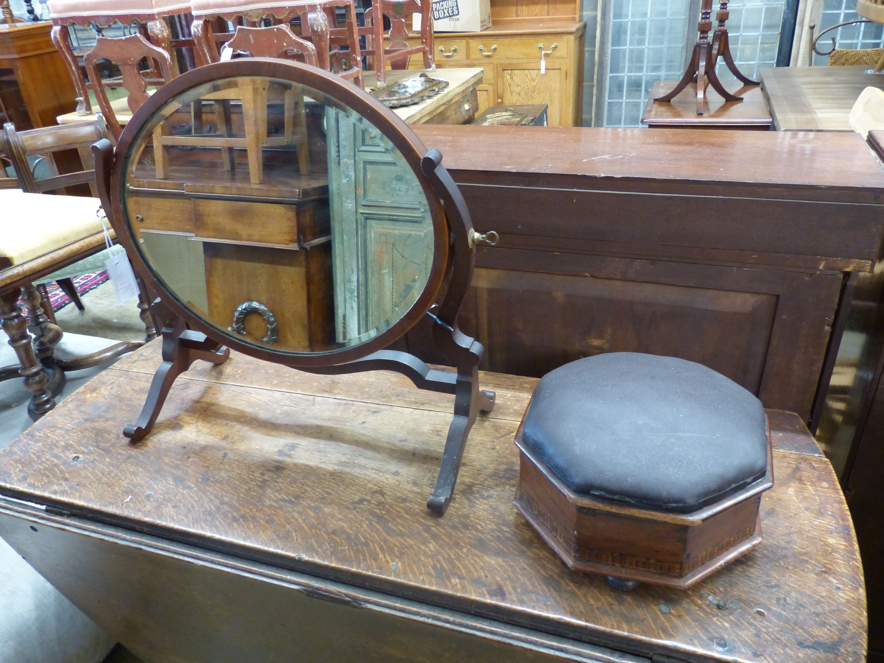 A Victorian octagonal box seat footstool, length 26cm, height 14cm and a toilet mirror